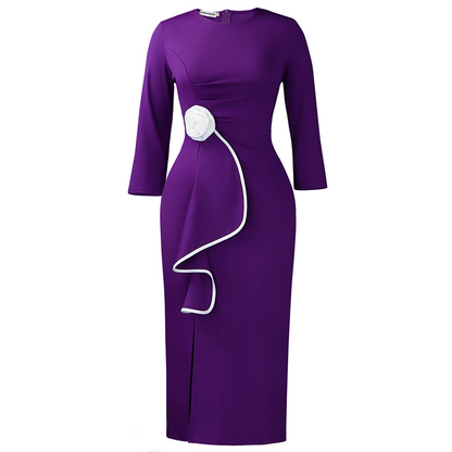 Elegant klänning med rund halsringning och volanger