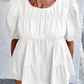 Top med puffärmar, smock och peplum