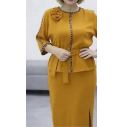 Set med peplum-top med bälte och pennkjol för dam
