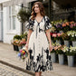 👗 50% RABATT NU! 🌿 Mjuk Klänning i Botaniskt Mönster med V-ringning & Medellång Kjol – Elegant, Lätt & Mångsidig För Alla Tillfällen 🌸