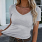 T-shirt med V-ringning i slim fit för damer