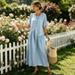 👗🌸 Avslappnad maxiklänning med knappar och kort ärm