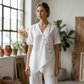 Set med asymmetrisk topp och byxor med vida ben för damer