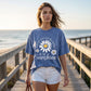 Unisex-T-shirt i lös passform med vintage-tvättat daisy-mönster
