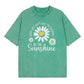 Unisex-T-shirt i lös passform med vintage-tvättat daisy-mönster