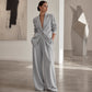 Set med elegant damblazer och byxor med vida ben
