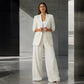 Set med elegant damblazer och byxor med vida ben