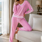 Set med V-ringad tröja och vida byxor för kvinnor