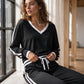 Set med V-ringad tröja och vida byxor för kvinnor